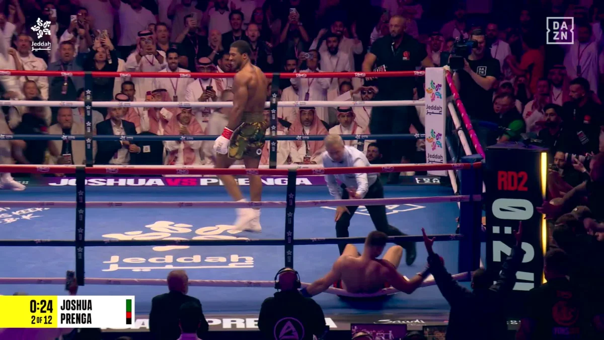 Joshua Triumphs Over Prenga in Dramatic Clash, Eyes Fury Showdown